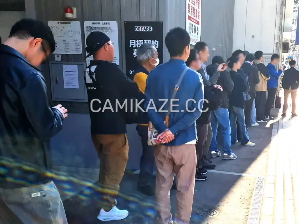 pussy cat sapporo customers waiting to enter the store at 4pm